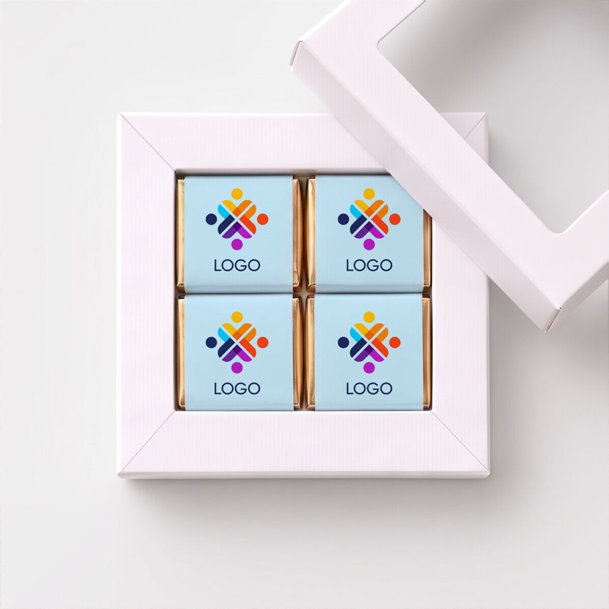 Gift box containing 4 mini chocolates personalised with a logo